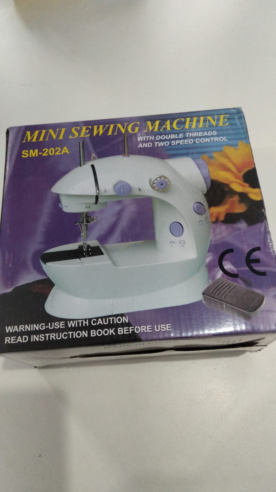 Mini maquina de coser